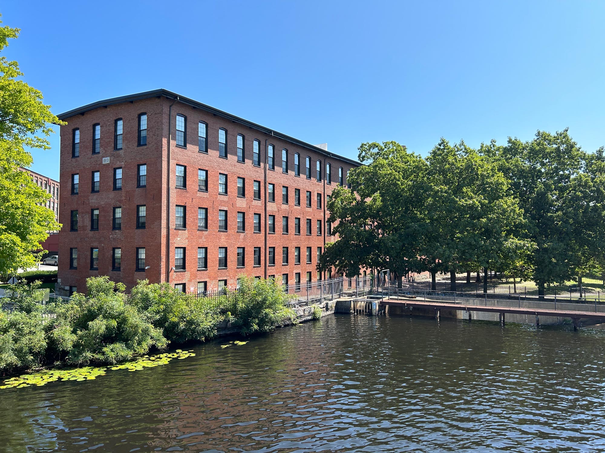 Affordable housing search interface showing community and residential buildings in Massachusetts