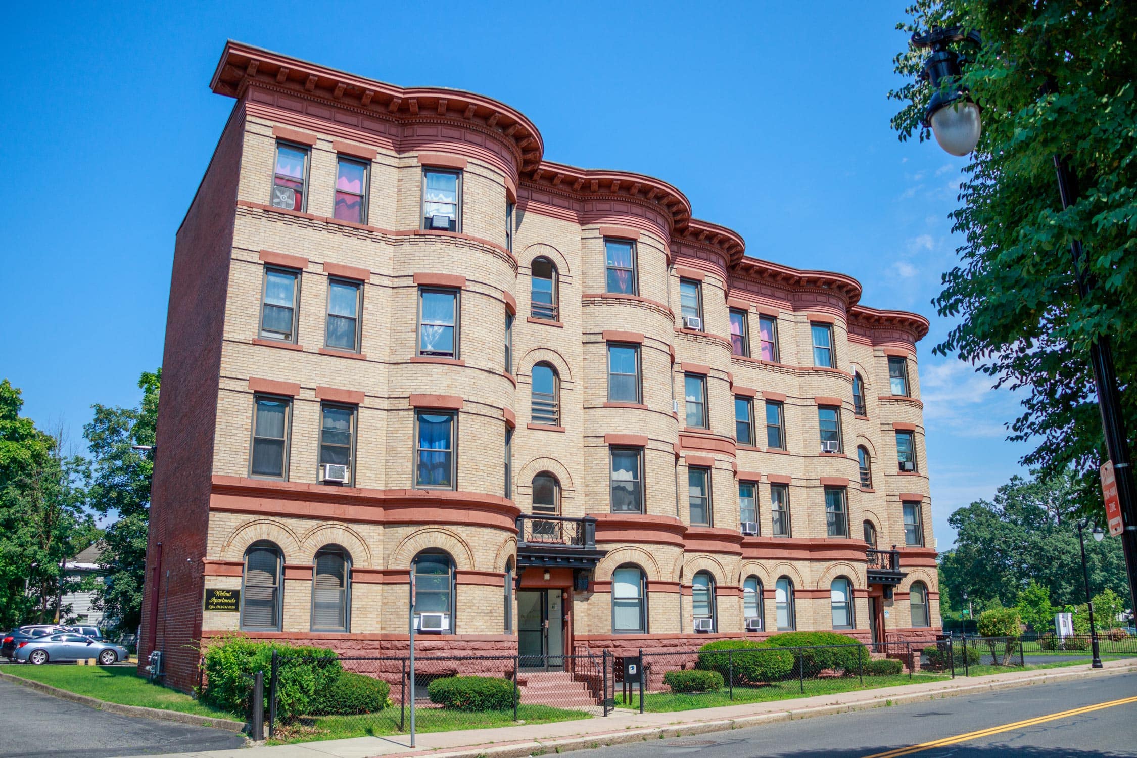 Affordable housing search interface showing community and residential buildings in Massachusetts