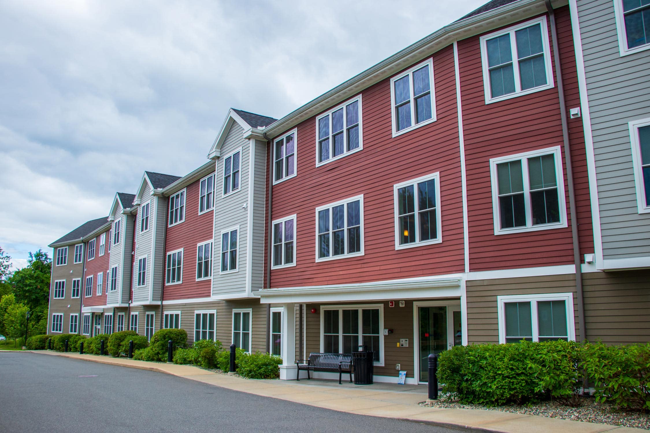 Affordable housing search interface showing community and residential buildings in Massachusetts