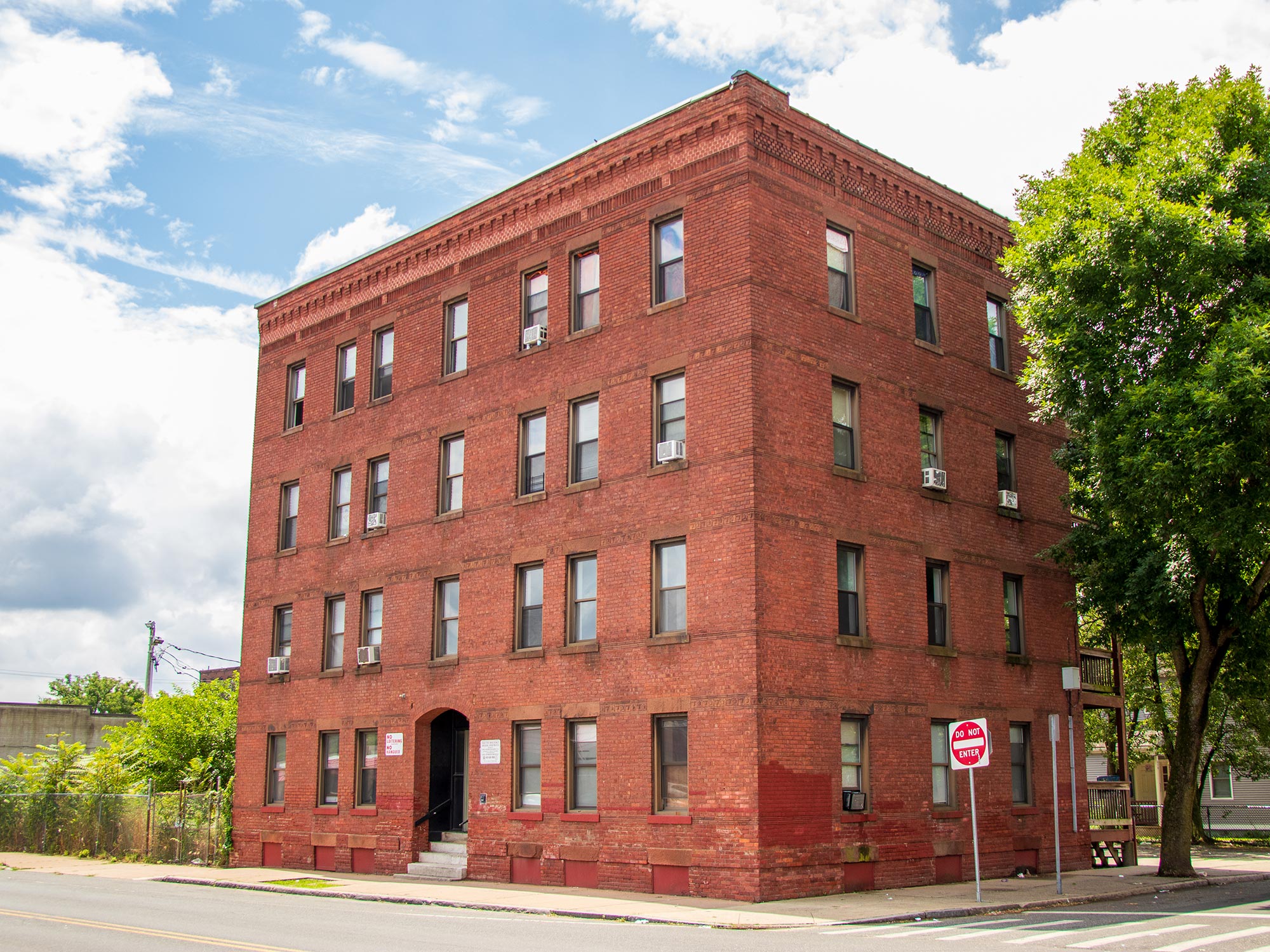 Affordable housing search interface showing community and residential buildings in Massachusetts