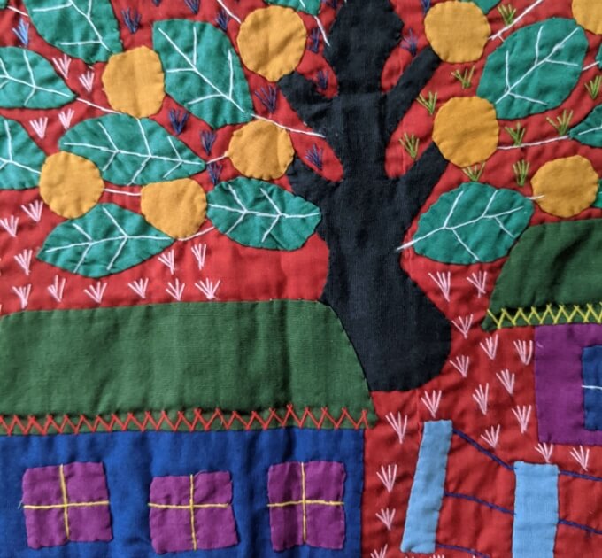 Colorful patterns on a quilt from Ecuador